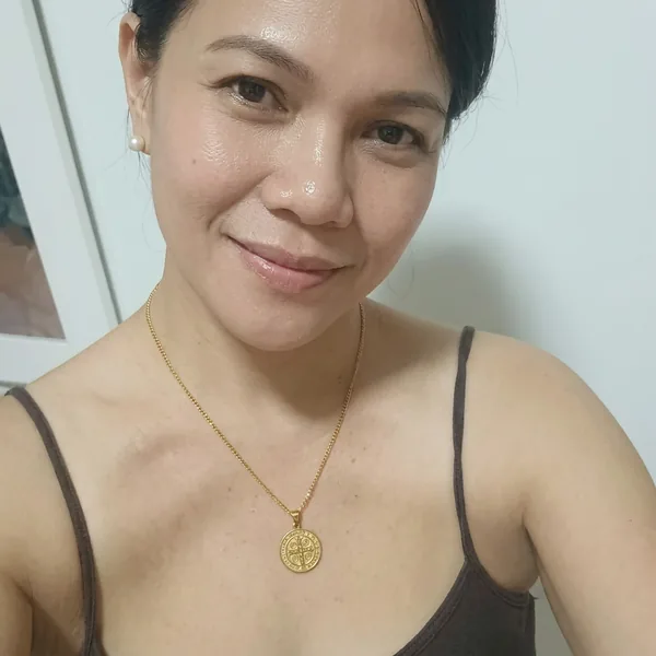 Julia H. wearing the Saint Benedict Necklace